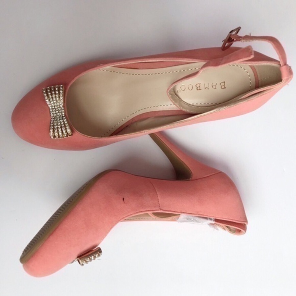Pink faux suede bamboo heels with bow